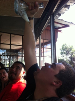 A classmate drinking in a Catalonian traditional way!